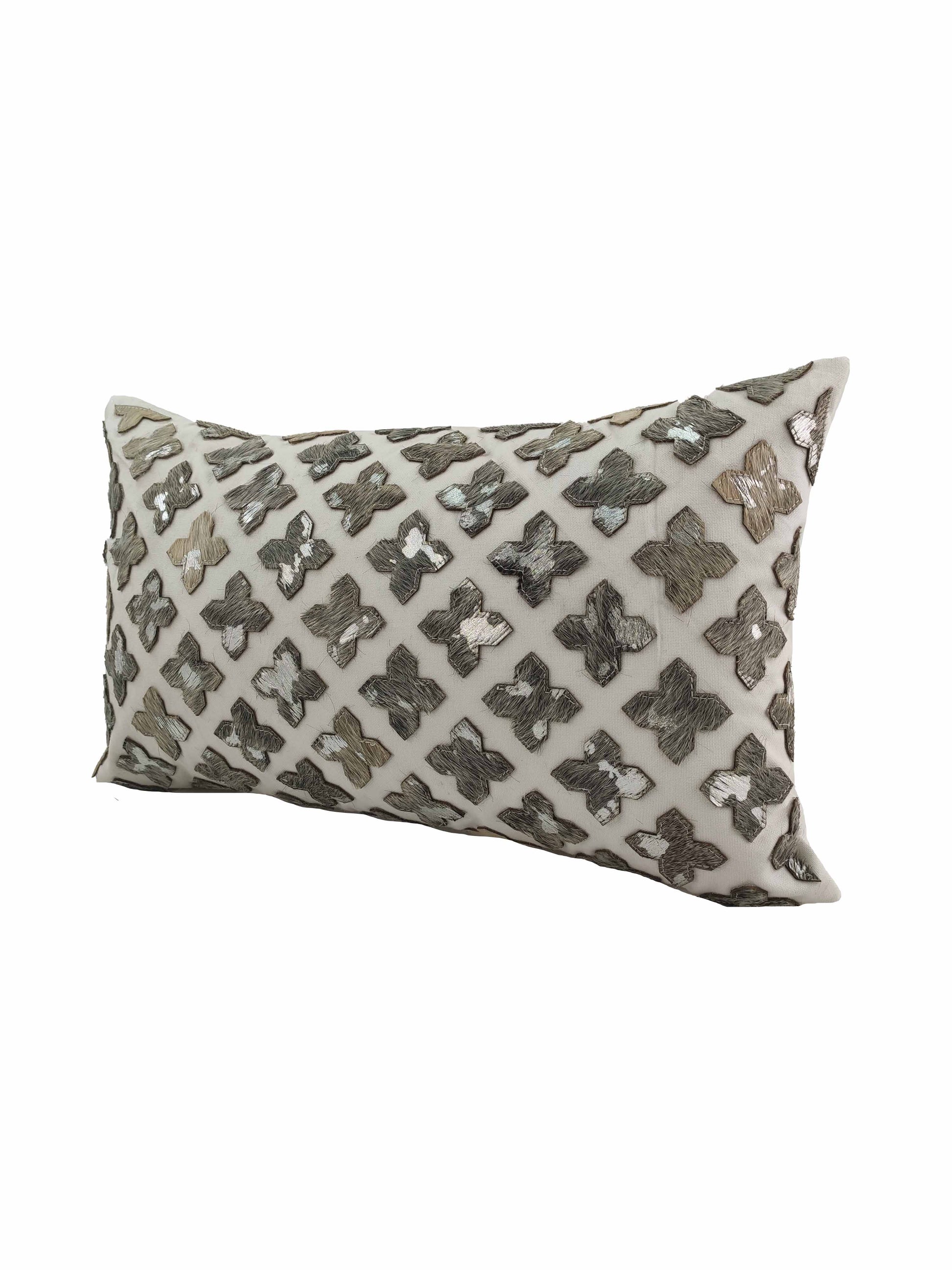 The RAMSHA HOME Leather Cushion CS-104 features a cream background with metallic silver and gray embroidered shapes in a diagonal grid, offering both comfort and a touch of elegance to any space.