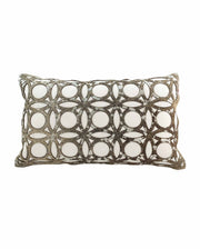 The Leather Cushion CS-100 by RAMSHA HOME is a durable rectangular pillow with a white base and metallic gold geometric patterns, adding lasting elegance to any space. The background is plain white.