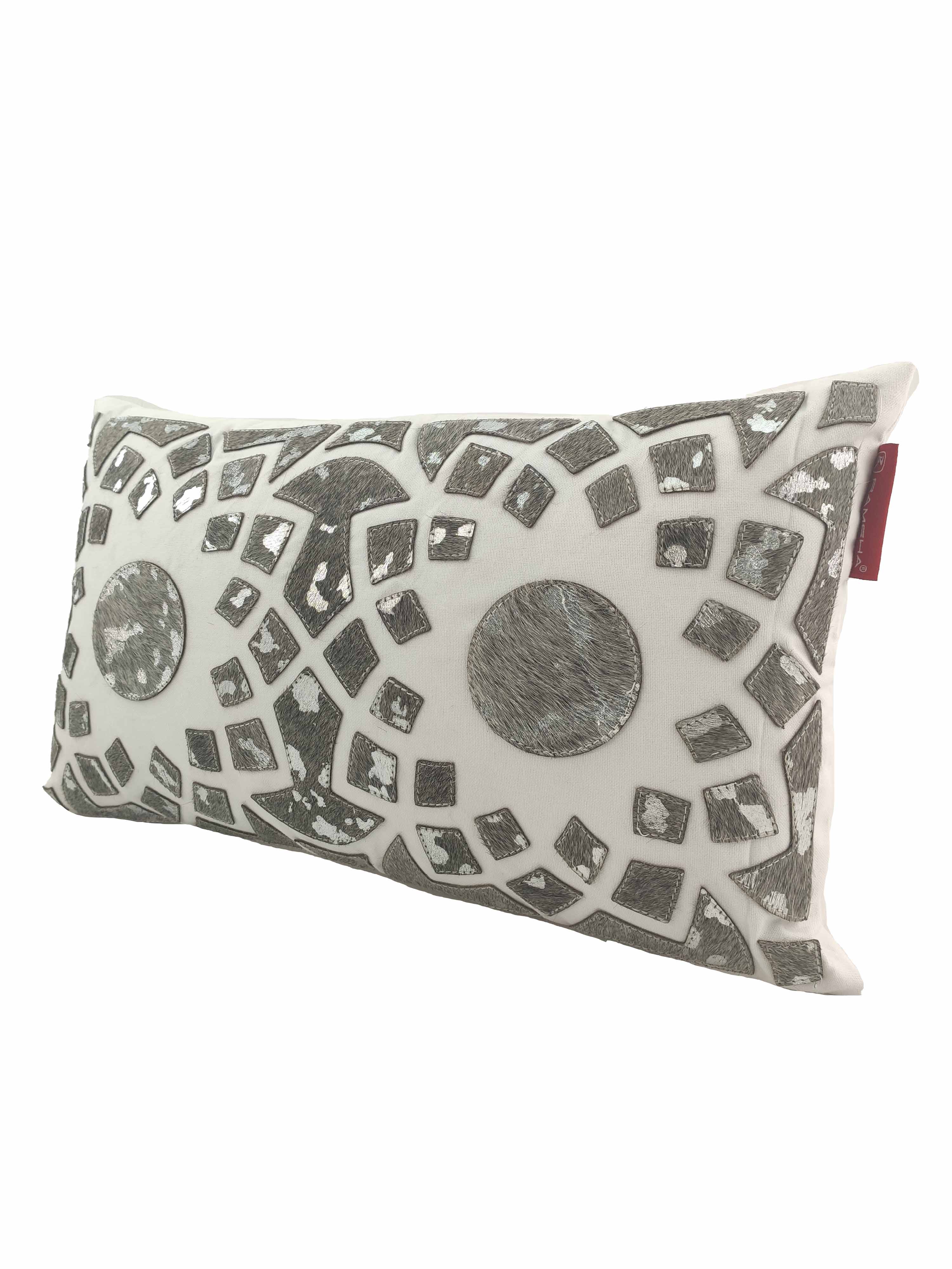 RAMSHA HOME Decorative Cushion CS-105: A rectangular cushion for your living space, featuring a white background with silver and gray mosaic shapes and circles. Crafted from polyester and leather, it includes a distinctive red side tag.