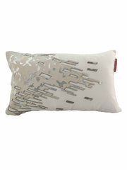 The RAMSHA HOME CS-108 Leather Decor Cushion is a rectangular white cushion with a geometric silver and beige embroidered pattern on one side and a small red fabric tag on the edge.