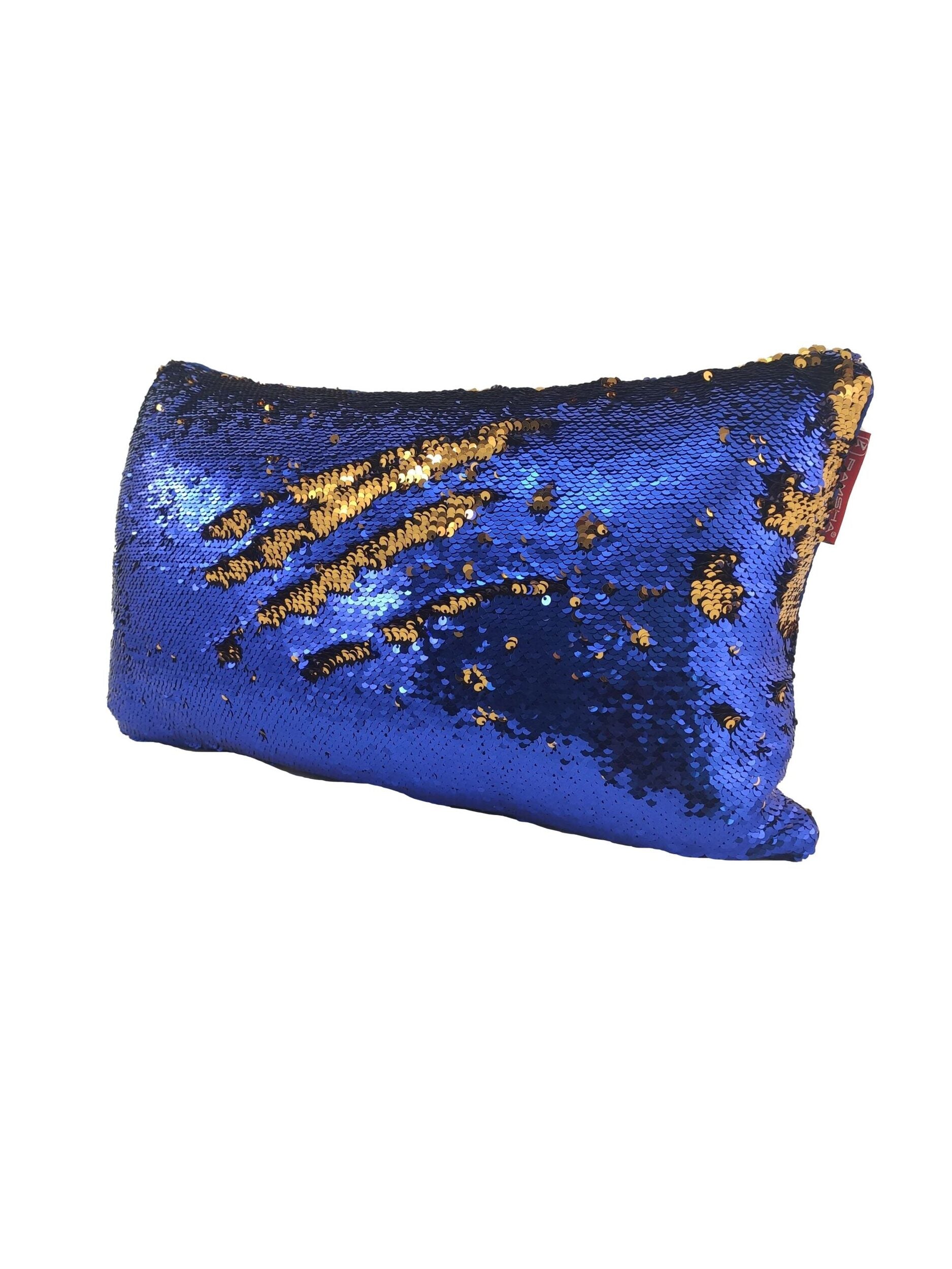 The RAMSHA HOME Polyester Double Color Changing Cushion With Filler is a rectangular pillow featuring shiny blue and gold reversible sequins, letting you create patterns by brushing the cushion in different directions.