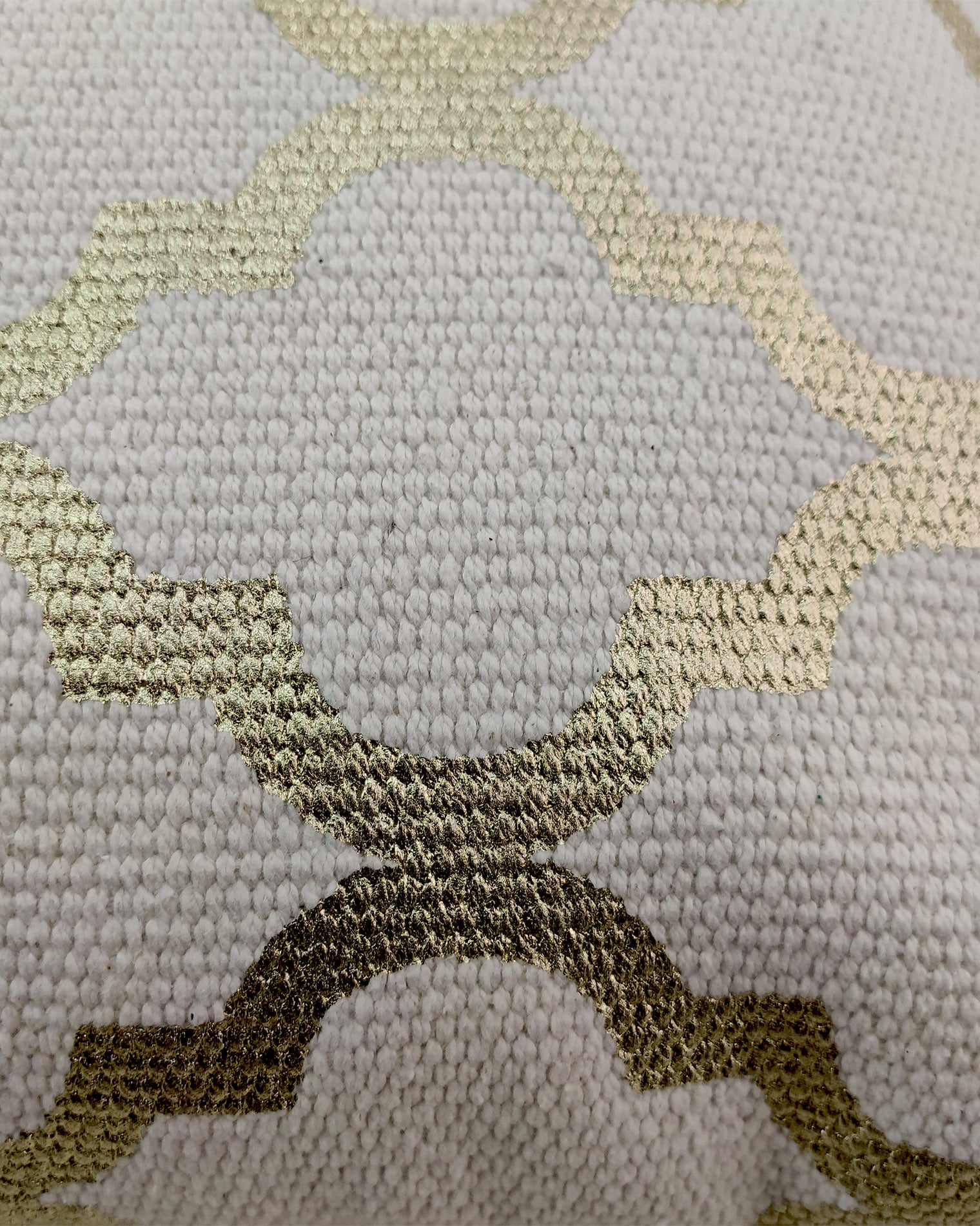 The RAMSHA HOME Cotton Cushion With Gold Foil Print CS-178 features interlocking geometric shapes in metallic gold foil on beige fabric, adding a touch of luxury and shine—ideal for elegant home decor.