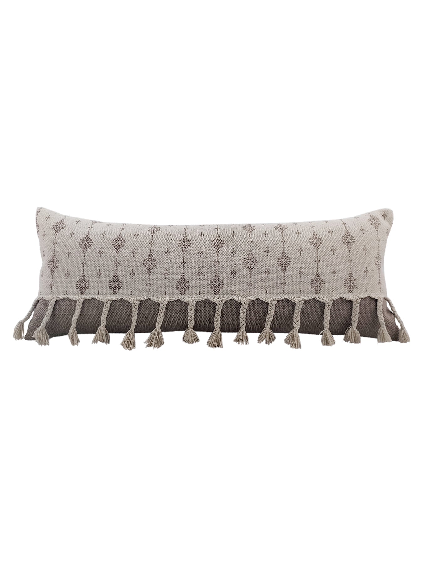 The RAMSHA HOME Printed Cotton Cushion With Fringes cs-172 is a long, rectangular light beige cushion with subtle geometric patterns and beige tassels along the edge. Made from printed cotton and includes a plush insert for extra comfort.