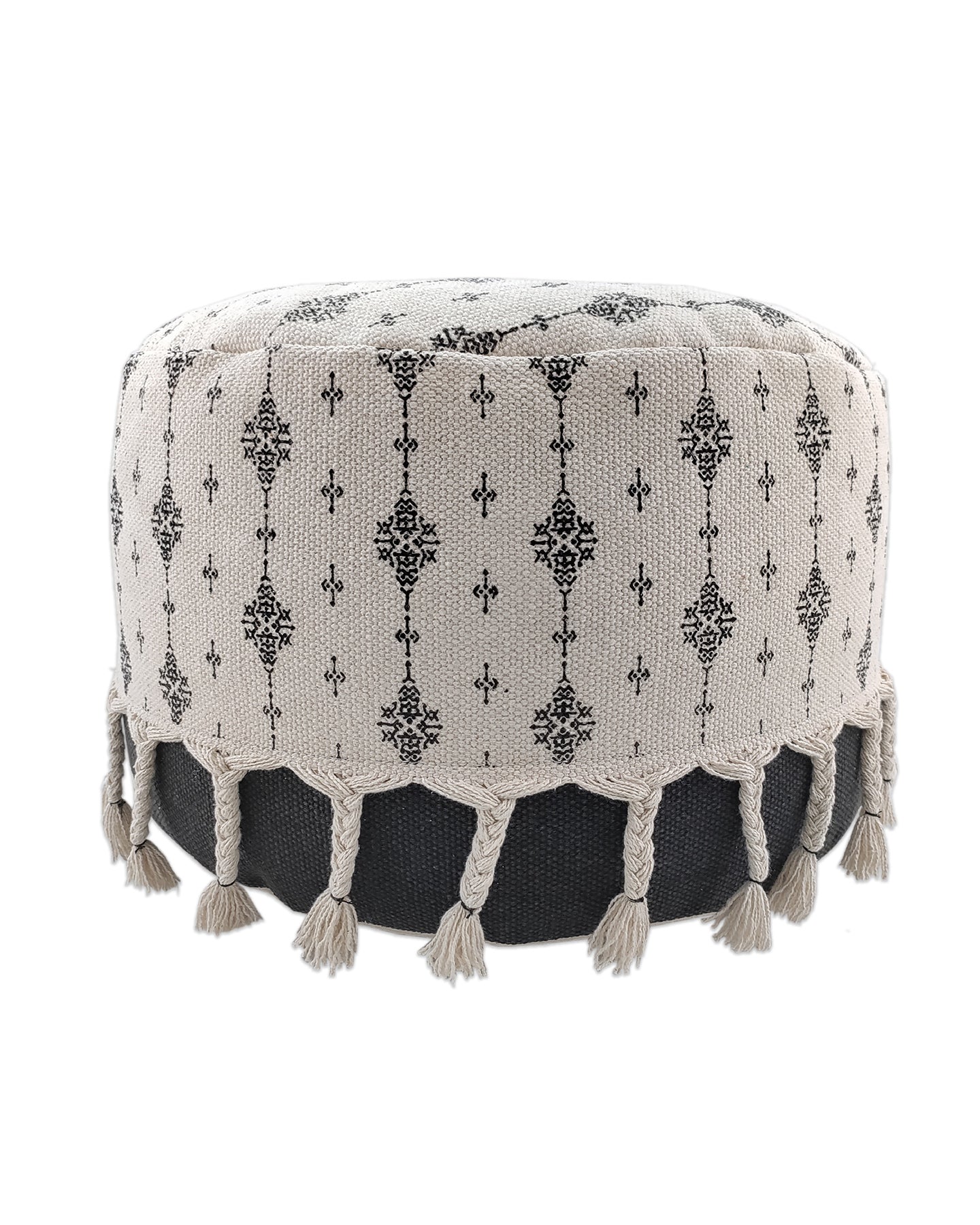 Handcrafted white and black pouf with fringe edges, perfect for adding texture and contrast to contemporary living spaces.