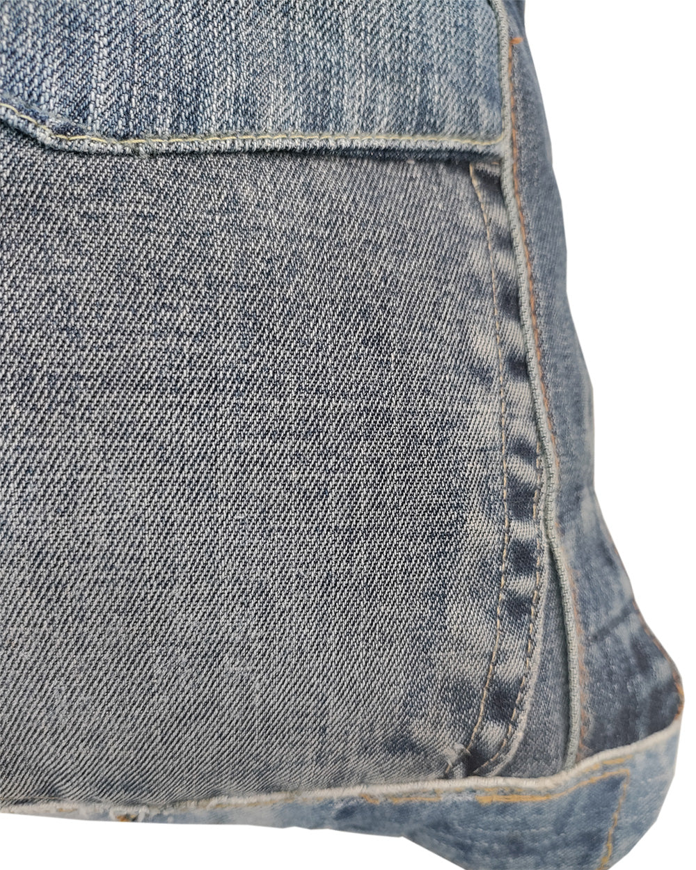 A close-up of the RAMSHA HOME Denim Cotton Cushion With Polyfill cs-189, crafted from recycled blue denim jeans with a back pocket and visible stitching.