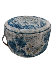 The RAMSHA HOME Multi Color Pouf With Leather Handle PF-079 features a round design with a blue, white, and yellow polyester cushion and a stylish brown leather side handle.