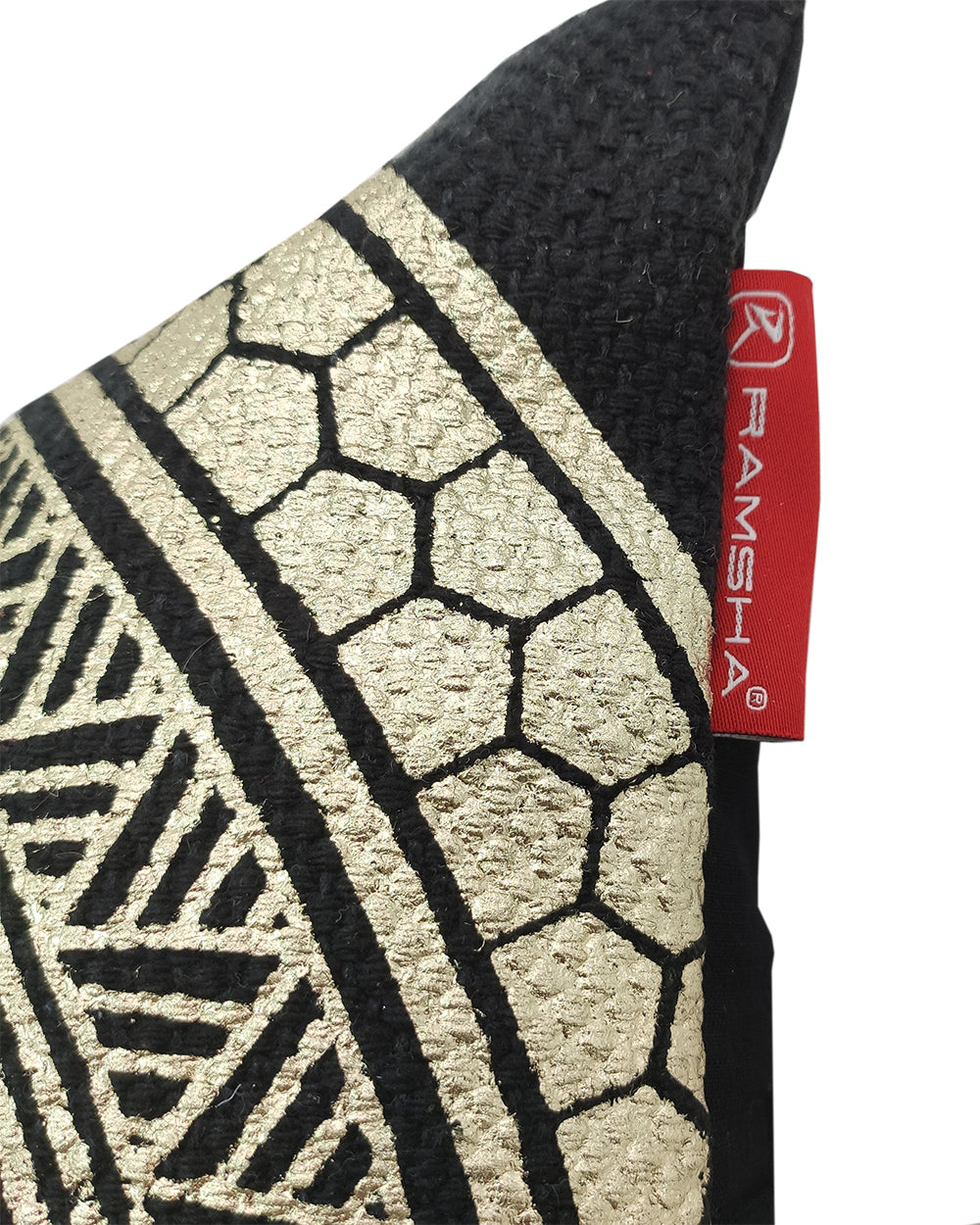 Close-up of the Gold And Black Foil Printed Cushion CS-197 by RAMSHA HOME, featuring textured geometric patterns and a red RAMSHA tag—perfect for adding glamour to any space.