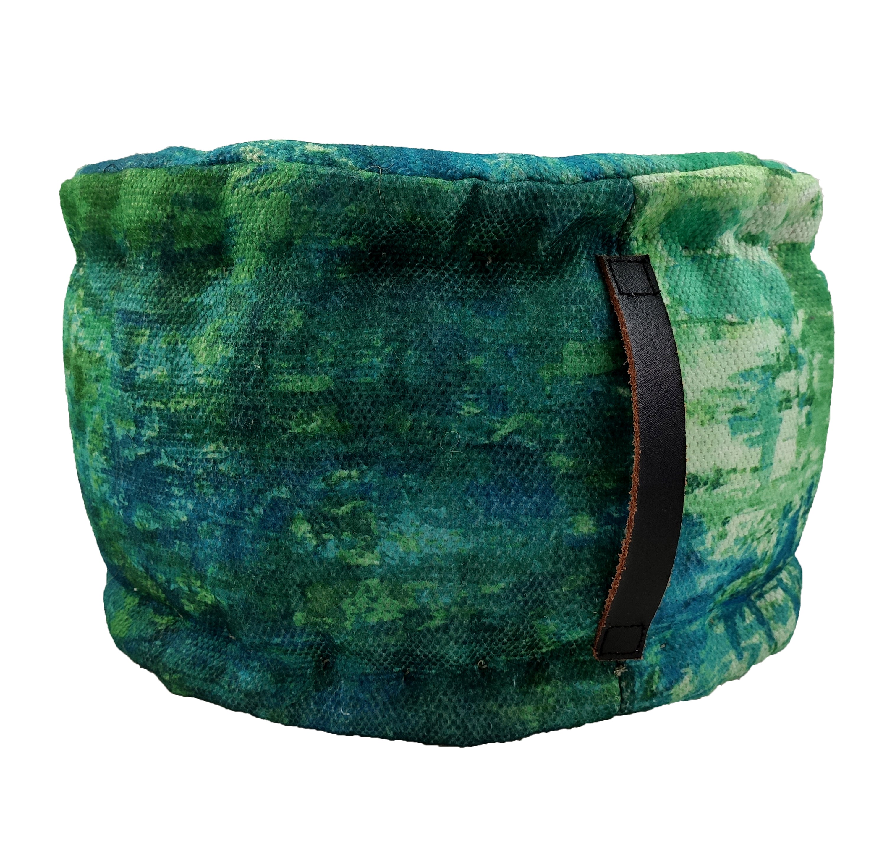 The RAMSHA HOME Printed Multi Color Pouf With Leather Handle has a cylindrical shape, made of polyester with green and blue abstract designs, and features a durable black leather side handle.