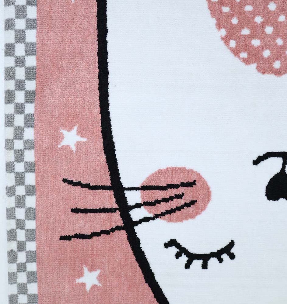 Close-up of the RAMSHA HOME Pink Cat Kids Rug - Cute Kitten Nursery Area Carpet KD-002 (120x180cm), featuring a soft cat face with closed eyes, pink cheeks, and whiskers, starry pink background, and checkered border—perfect for kids’ bedrooms.