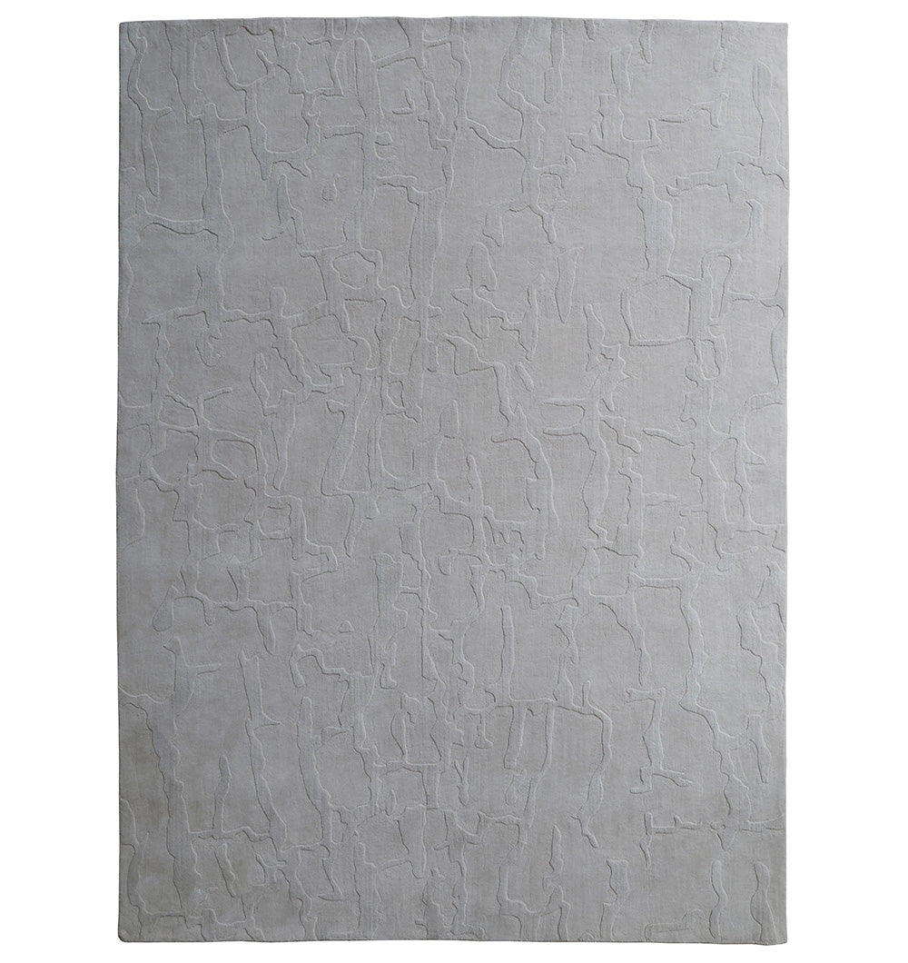 The RAMSHA HOME Decorative Light Brown Color Area Rug (LKH-027, 300x400 cm) features a modern textured design with raised abstract lines and shapes, making it an ideal choice for contemporary decor.