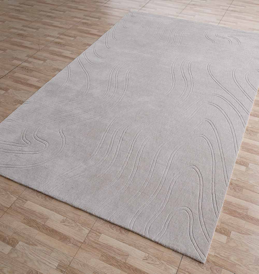 The RAMSHA HOME Rectangle Handmade Lt.Grey Color 200x300 cm Area Rug (LKH-036) is displayed on a wooden floor with a light brown and tan square tile pattern.