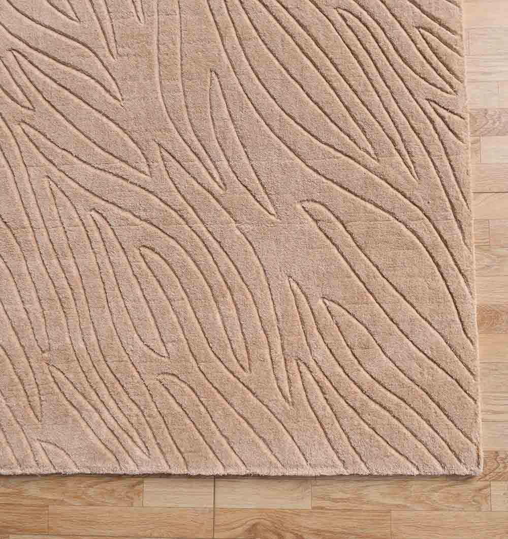 The RAMSHA HOME Rectangle Handmade Beige Color 200x300 cm Area Rug (LKH-042) features a raised, abstract wave pattern and clean edges for a modern, textured look, perfect for enhancing any contemporary space.