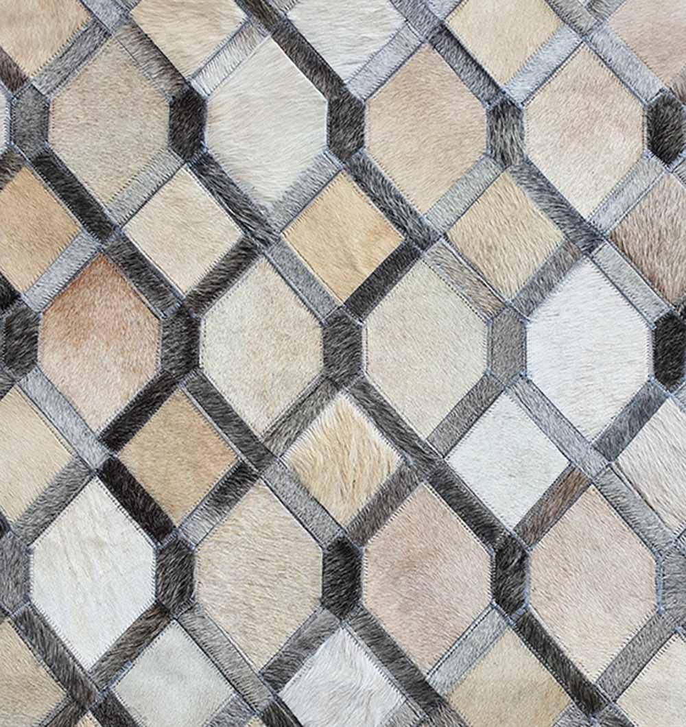 Close-up of handmade grey leather rug LR-002 showing geometric pattern and soft leather texture