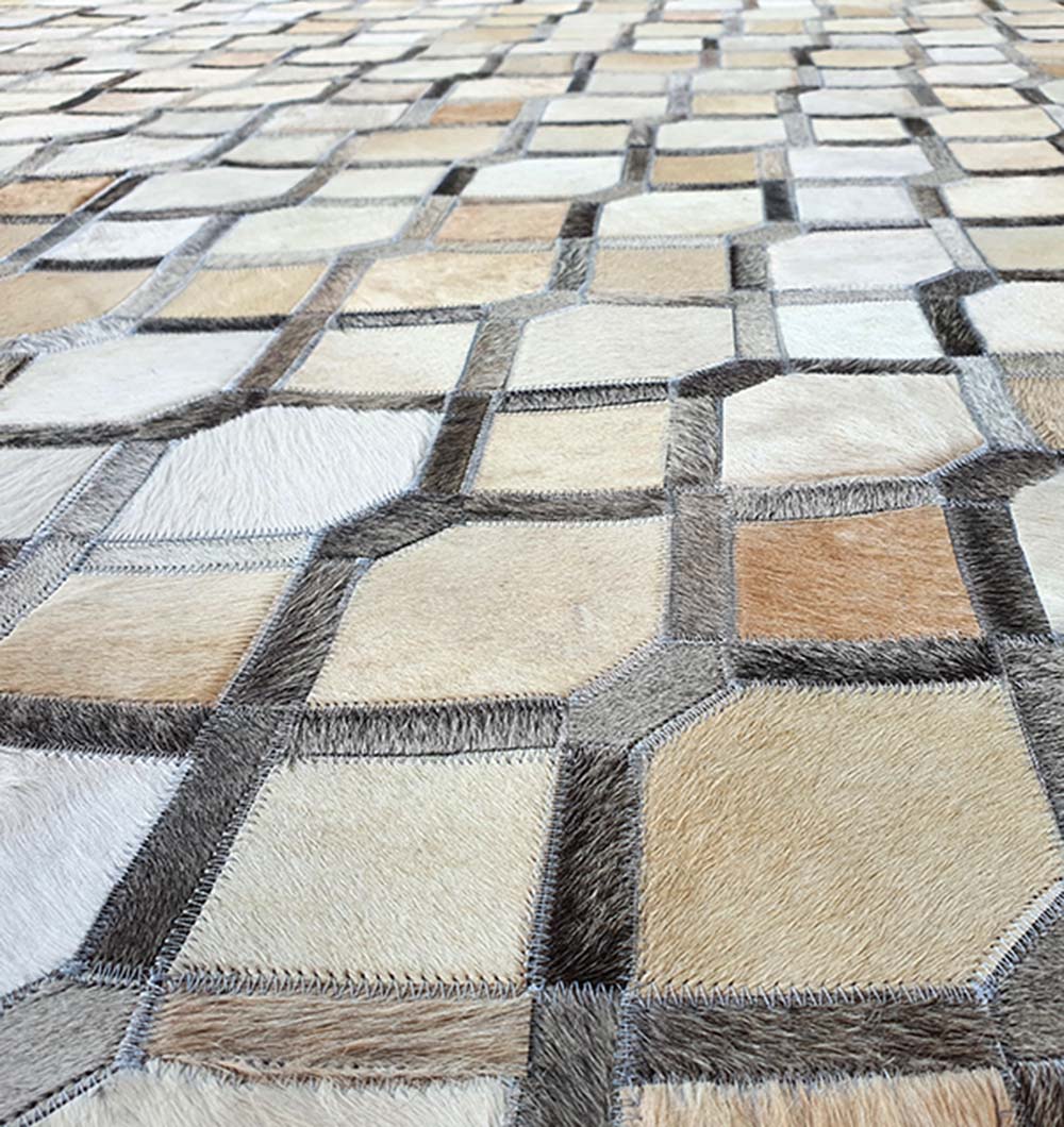 Detailed view of LR-002 leather rug highlighting premium grey leather and stitched geometric pane