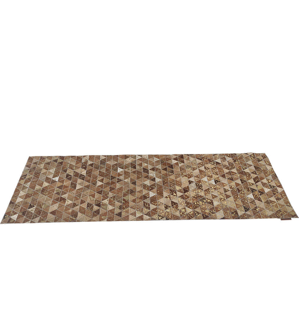 The Amazing Grey & Tan Color Playroom Leather Rug - LR 006 features a geometric patchwork design with triangles in grey and tan shades, creating a striking mosaic pattern that repeats across the rug’s surface.