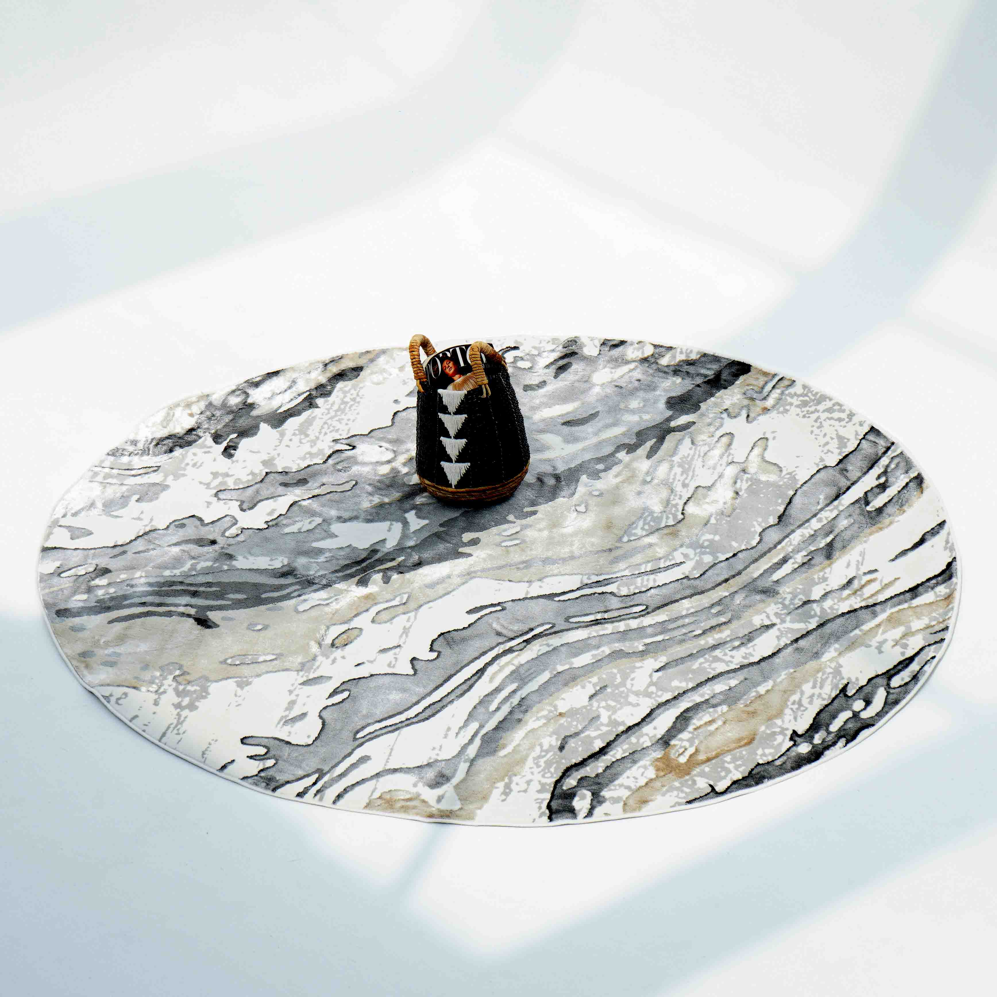The RAMSHA HOME Shrink Cream ND53K Polyester Decorative Floor Rug is the perfect base for a chic, minimal look—pair it with a marble-patterned tray and a stylish black cup to elevate any space.
