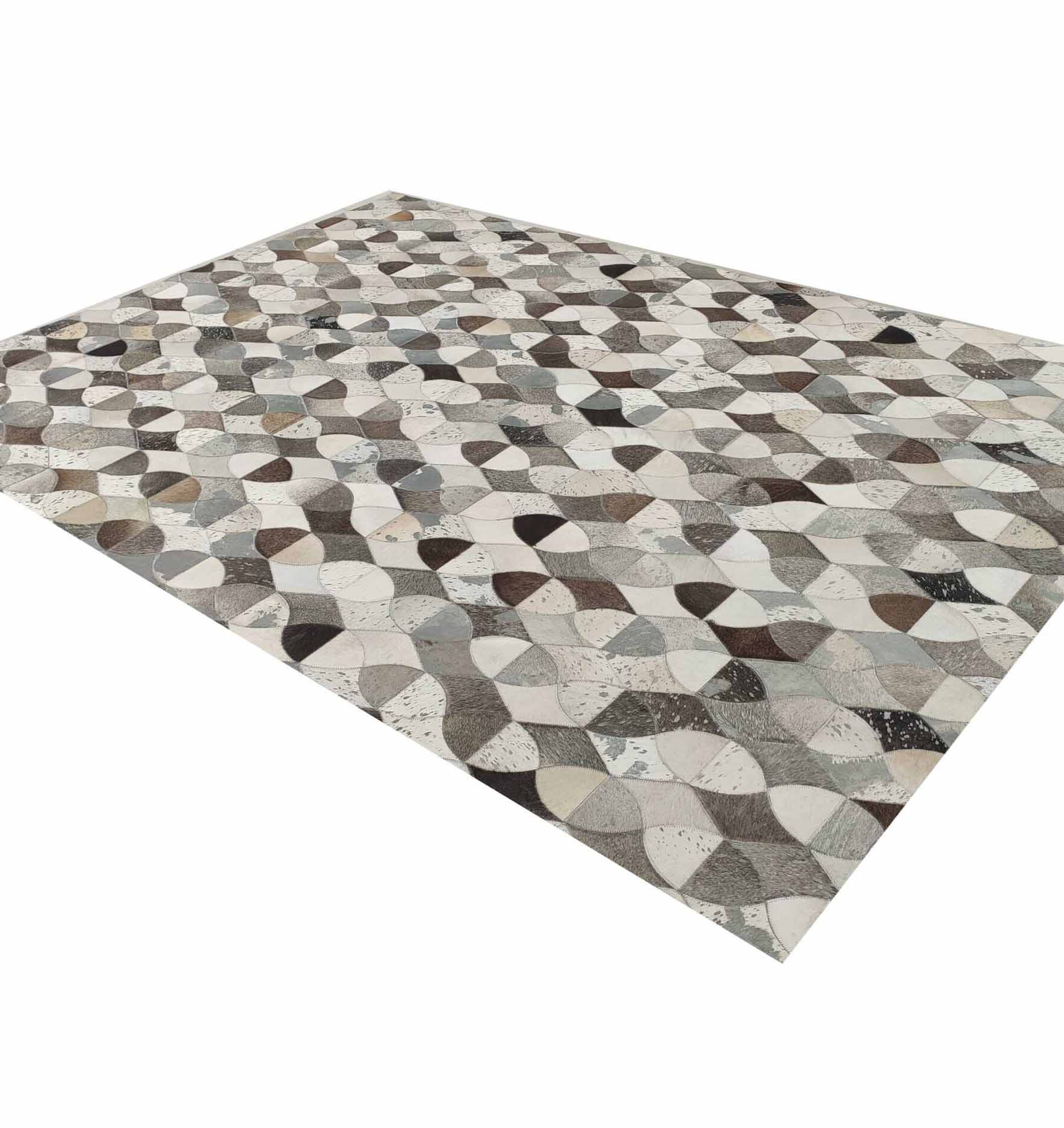 The Delightful Modern Grey Color Leather Rug - LR 008 by RAMSHA HOME features overlapping shapes in gray, brown, and cream for a modern, textured look—ideal for adding style to your space.