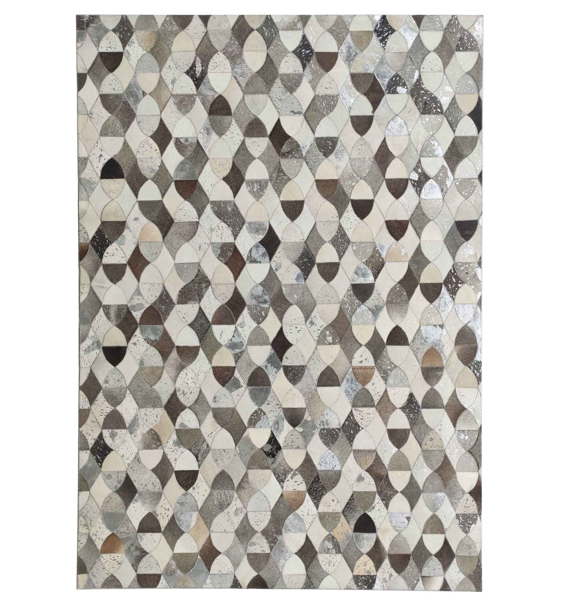 The Delightful Modern Grey Color Leather Rug - LR 008 by RAMSHA HOME features a textured mosaic of interlocking shapes in gray, brown, beige, and white, evoking the look of a modern leather patchwork rug.