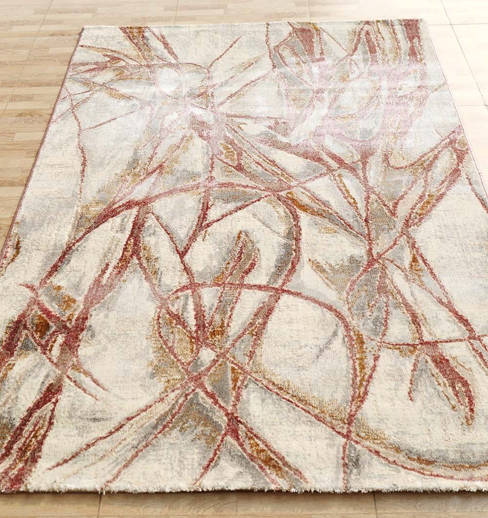 The RAMSHA HOME Abstract Scribble Line Ivory Rug with Rust & Gold Accents (MMB 01, 150x210 cm) features intersecting lines on a cream background, adding modern style and practicality to your light wood floor. Machine-made for elegance and durability.