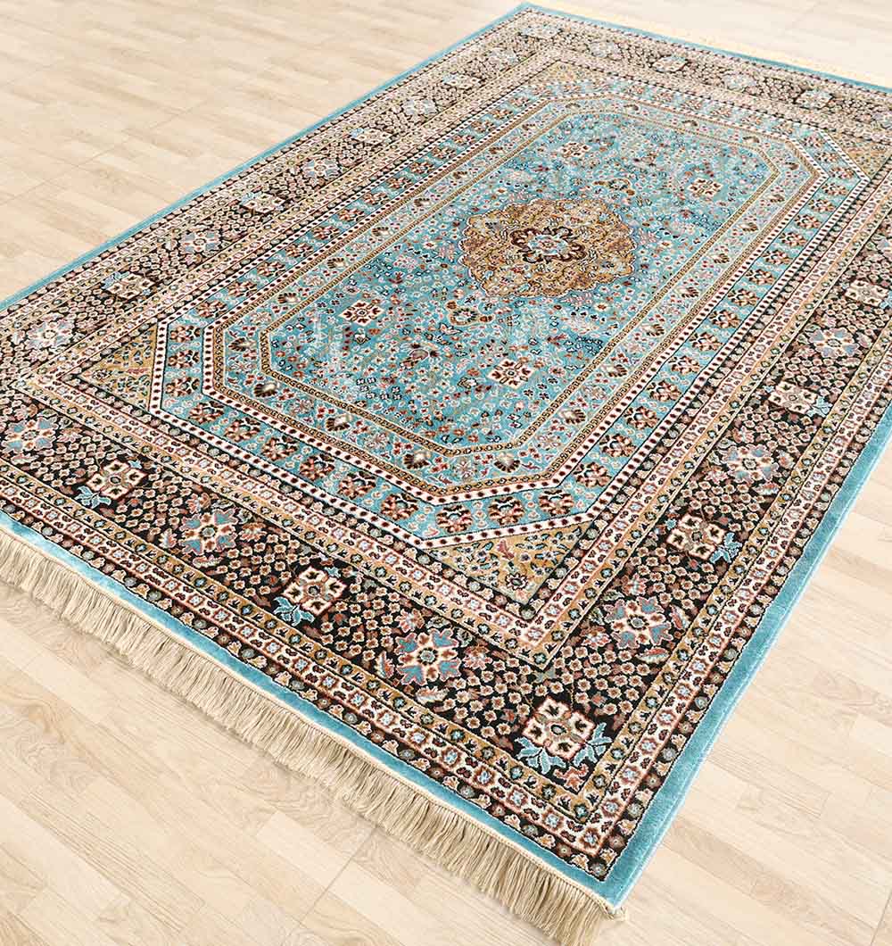 The RAMSHA HOME Persian Medallion Teal Blue Rug with Black Border (MMB 06, 175x275 cm) features intricate geometric and floral patterns, a central medallion, and fringe on the short edges, beautifully displayed on a light wood floor.