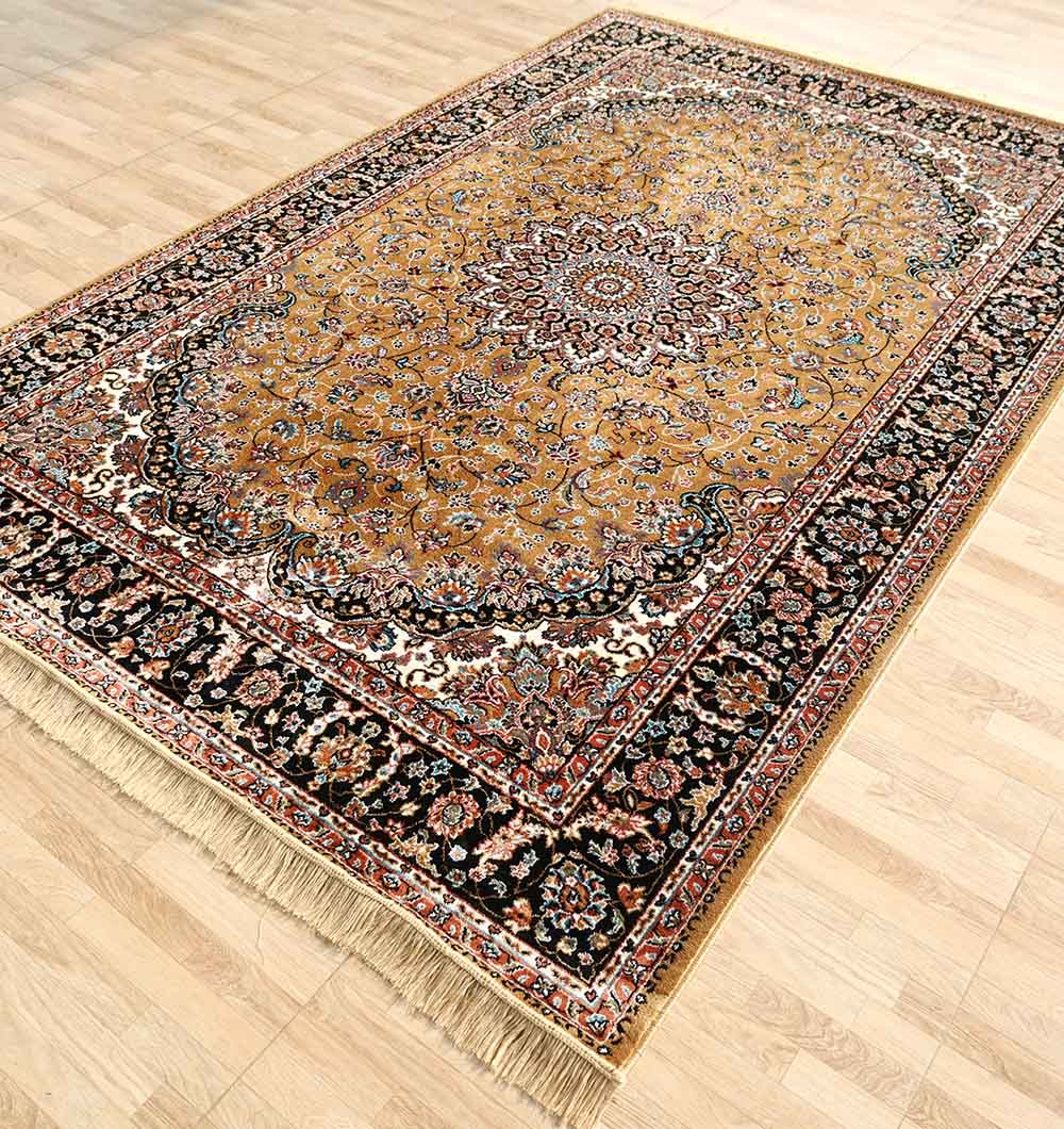 The RAMSHA HOME Persian Floral Medallion Rust & Black Border Rug (MMB 09, 175x275 cm), featuring an ornate central medallion and gold floral motifs, lies on a light wood floor with machine-made fringes accenting the edges.