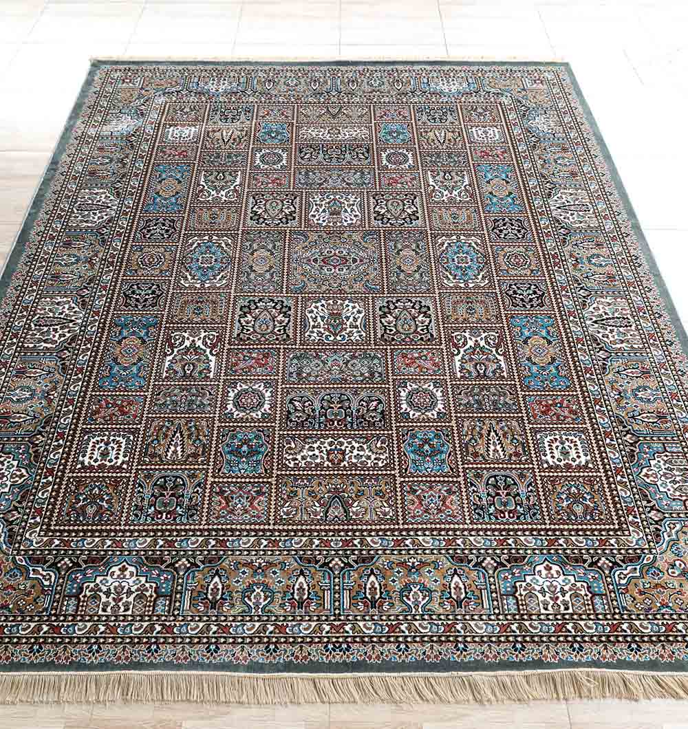 The RAMSHA HOME Persian Patchwork Medallion Multicolor Rug – MMB 19 (265x365 cm) showcases geometric and floral Persian motifs in blue, brown, white, and beige bordered by ornate patterns with fringed short edges.