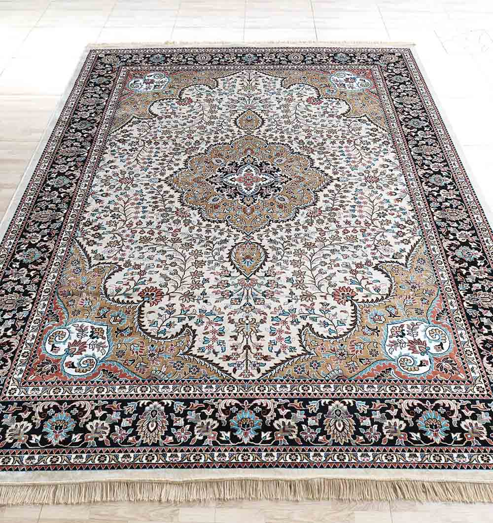 The RAMSHA HOME Multi Color Decor Rug - MMB 20 (265X365 cm), featuring ornate Persian-style patterns in beige, black, blue, red, and gold with a detailed border, rests on a light wood floor.