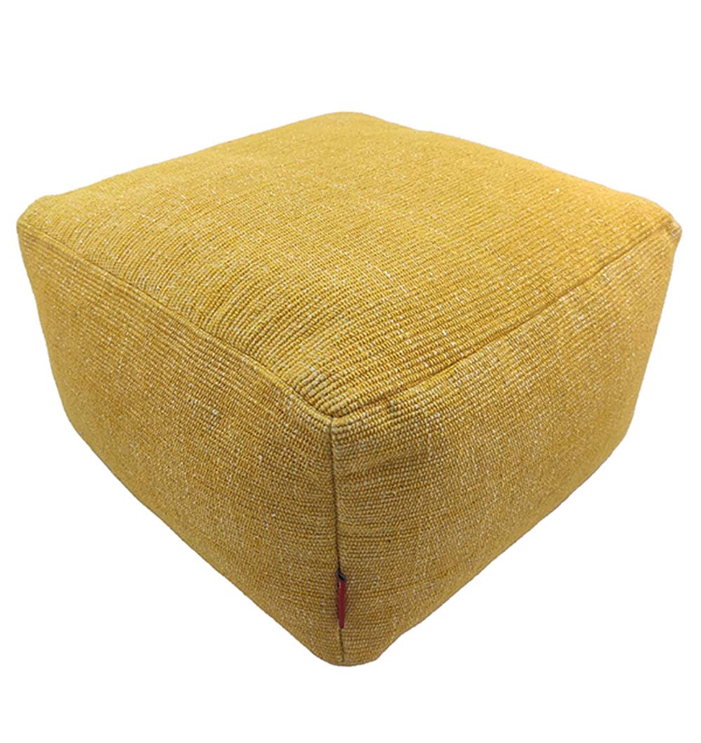 Handmade yellow cotton pouf with soft texture and durable design, perfect for bright and cozy interiors.