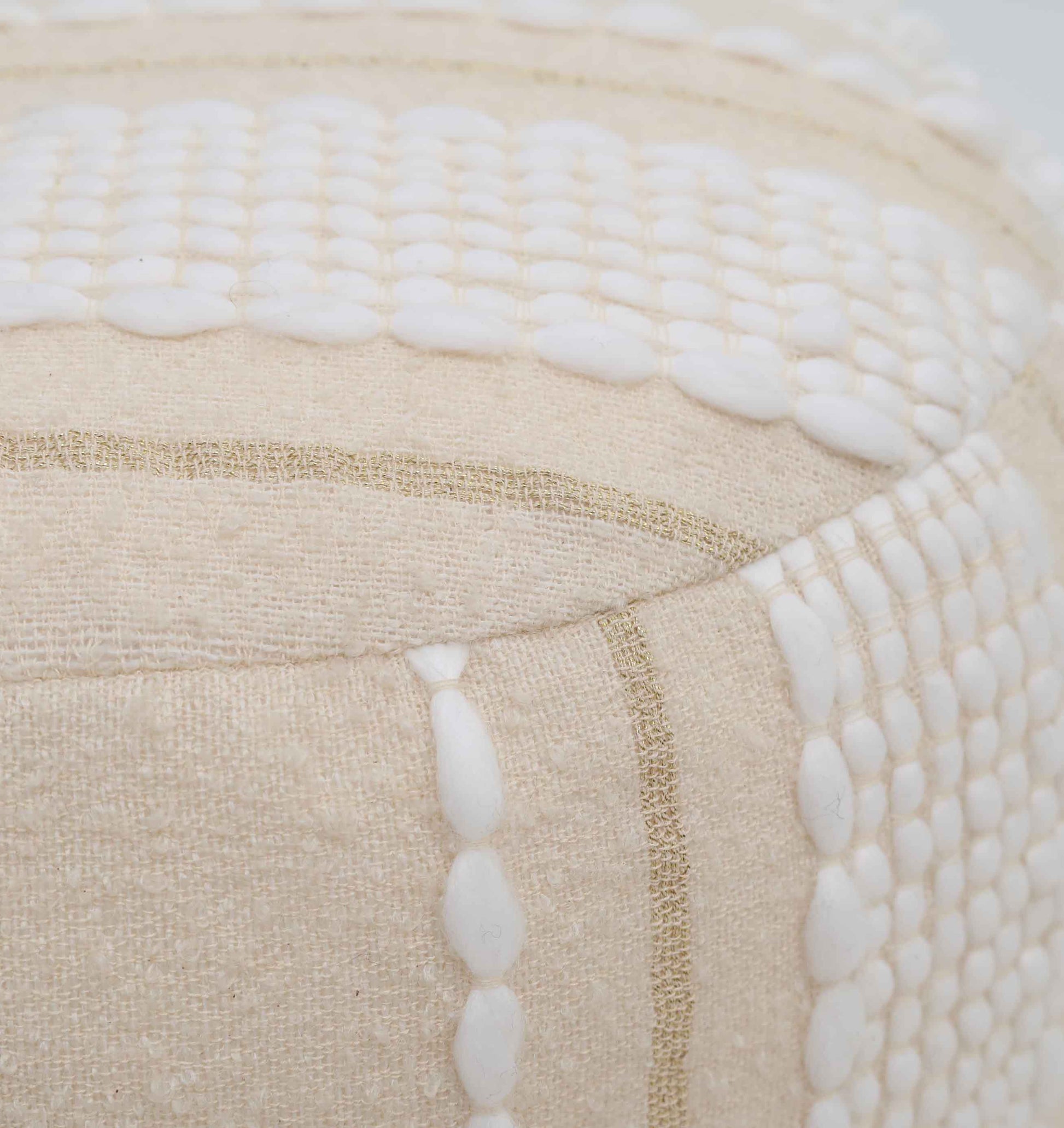 Close-up of the RAMSHA HOME Boho Modern Round Pouf With Insert PF 090—beige fabric with white textured bead-like details and thin gold geometric lines, perfect as extra seating for contemporary spaces.