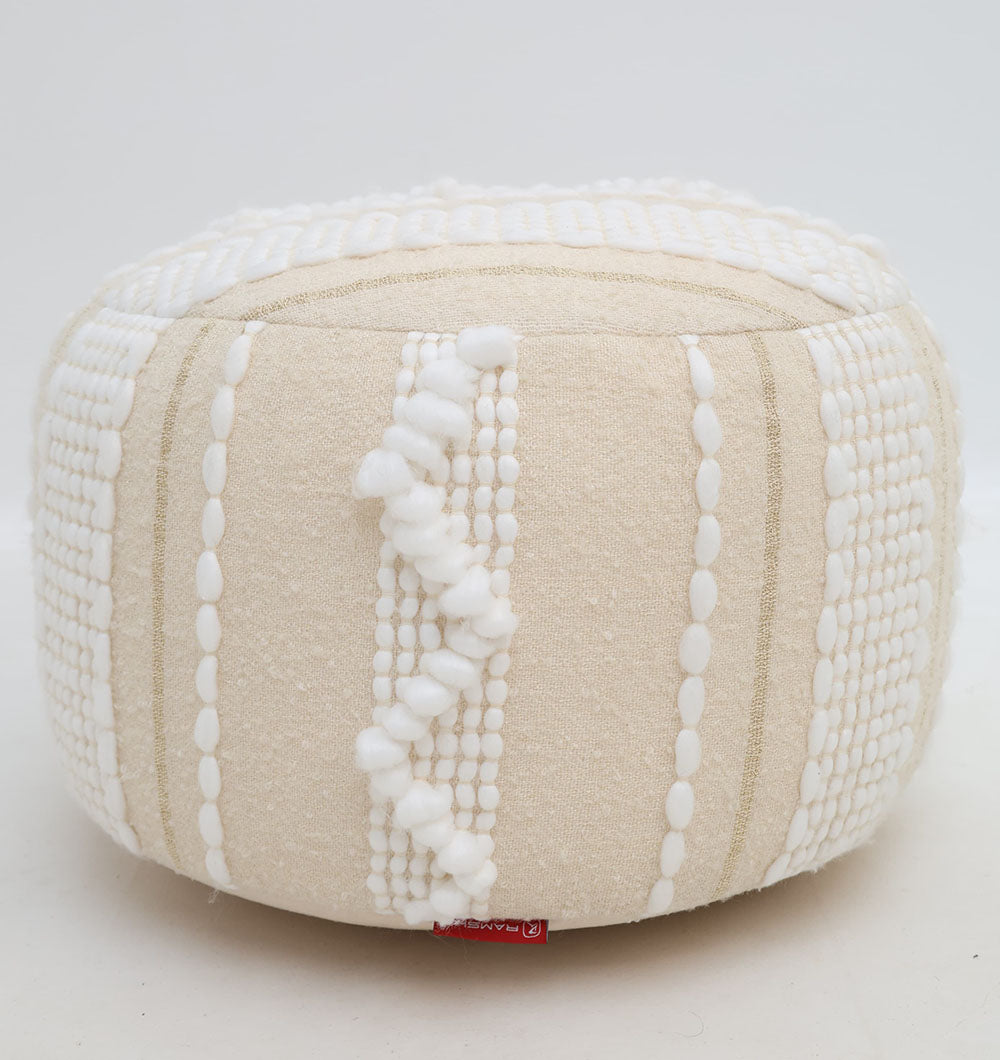 The RAMSHA HOME Boho Modern Round Pouf With Insert PF 090 features beige fabric with textured white stripes, raised dots, and lines—ideal for extra seating or modern décor. Shown on a plain white background.