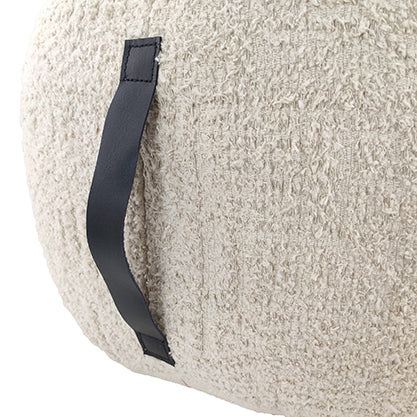 Close-up of the RAMSHA HOME White Cotton Pouf PF-094 shows its textured cream fabric surface and attached black leather handle.