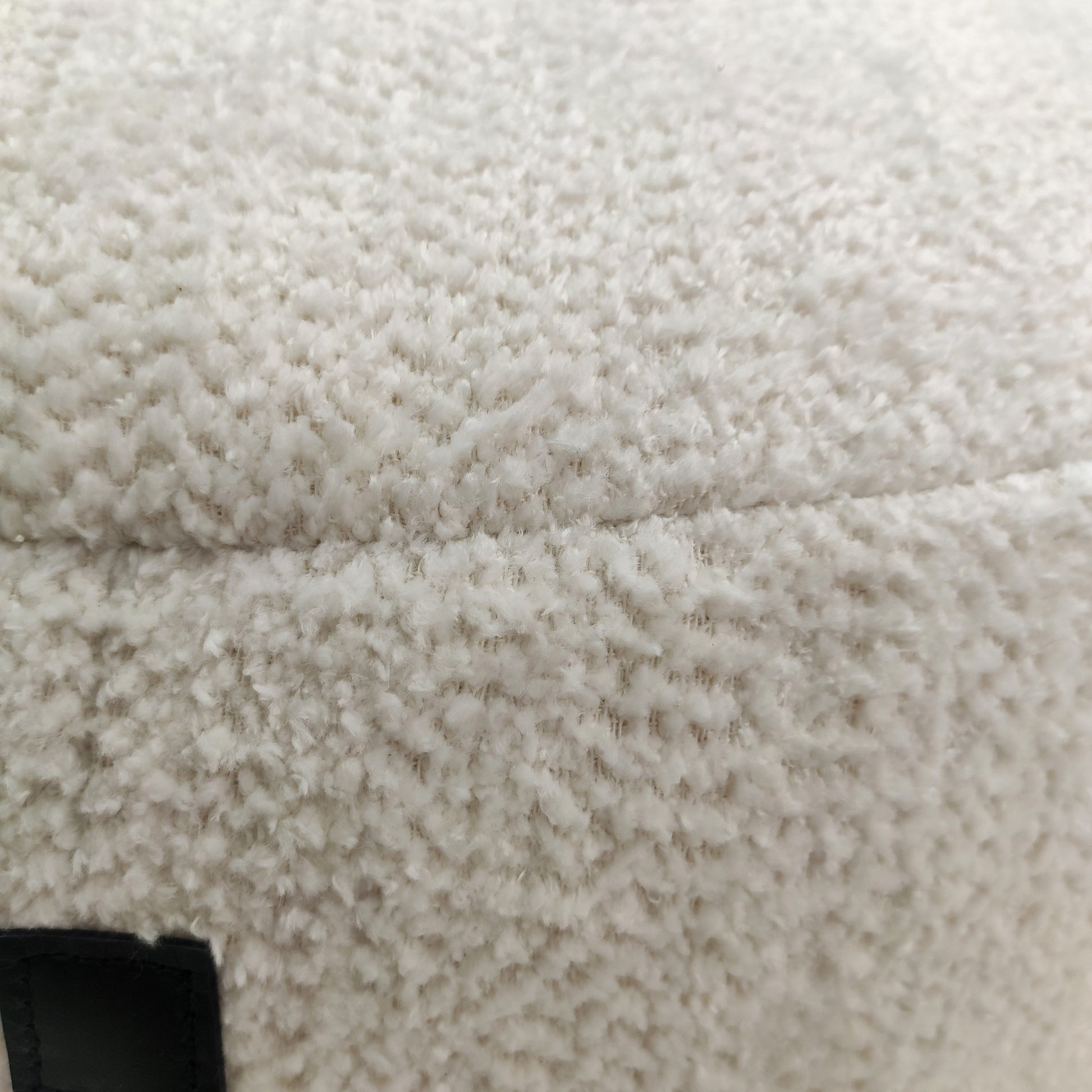 Detailed shot highlighting the soft cotton fabric and high-quality craftsmanship of the White Cotton Pouf PF-095.