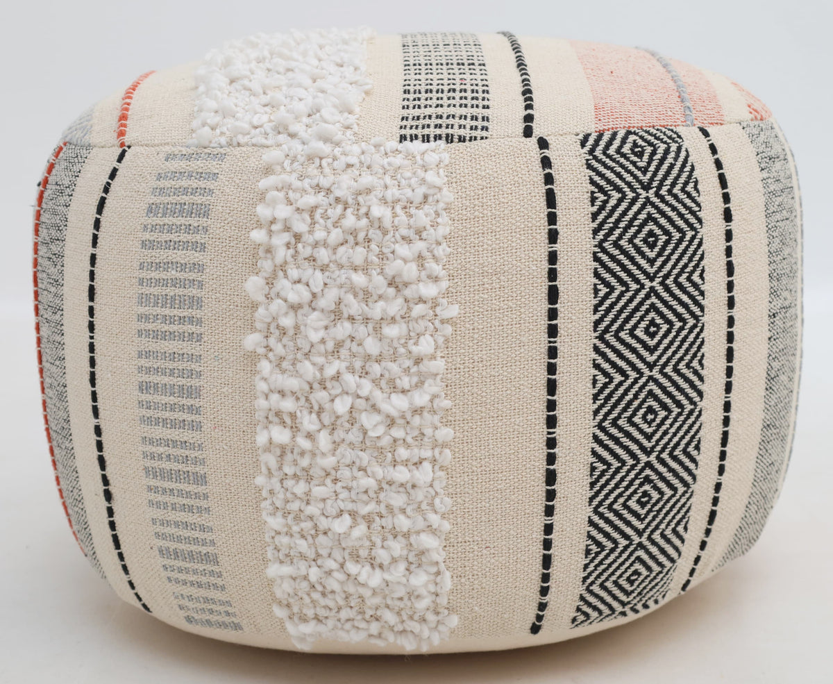 The Boho Modern Round Pouf with Insert PF 105 by RAMSHA HOME features a cotton, textured woven fabric in black, white, and beige with a mix of patterns including stripes, diamonds, and a bumpy white vertical band—making it perfect as extra seating or a decorative floor accent for any living space.