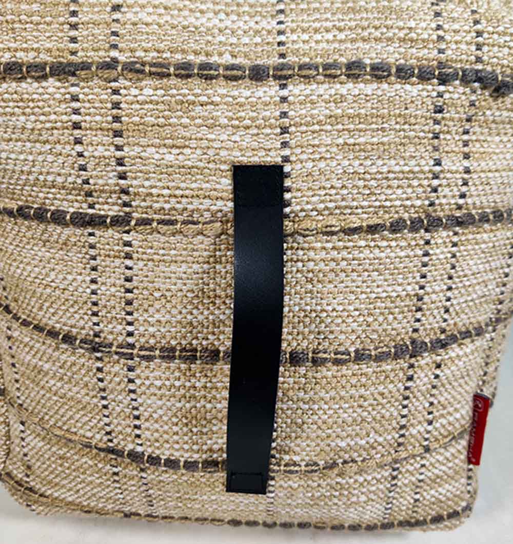 Macro shot of multicolor woven polyester pouf PF-108 showcasing handmade craftsmanship