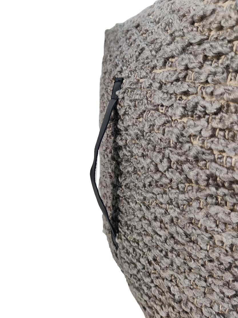 Close-up view showing detailed polyester texture and stitching of grey pouf PF-110 for modern home decor
