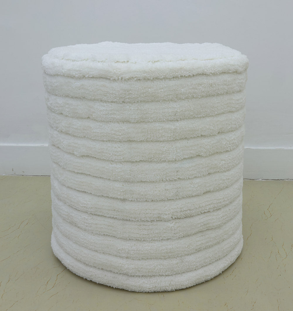 The RAMSHA HOME Luxury Handmade Pouf with Thermocol Bean Bag Insert PF-149 features a round, white, textured design with horizontal ridges, adding stylish extra seating to any space.