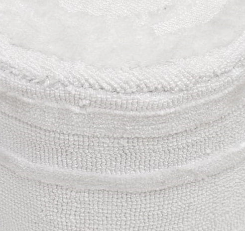 Close-up image of a neatly rolled white towel with soft, textured fabric and subtle stitching—a perfect accent to premium home décor alongside the RAMSHA HOME Luxury Handmade Pouf with Thermocol Bean Bag Insert PF-150.
