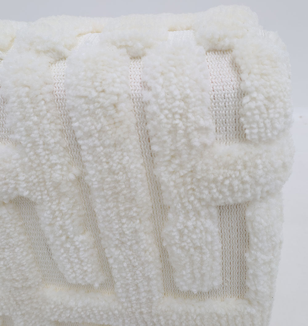 Close-up of the RAMSHA HOME Luxury Handmade Pouf with Thermocol Bean Bag Insert PF-151, featuring a soft, plush off-white geometric texture—an ideal premium accent for home décor—displayed against a simple white background.
