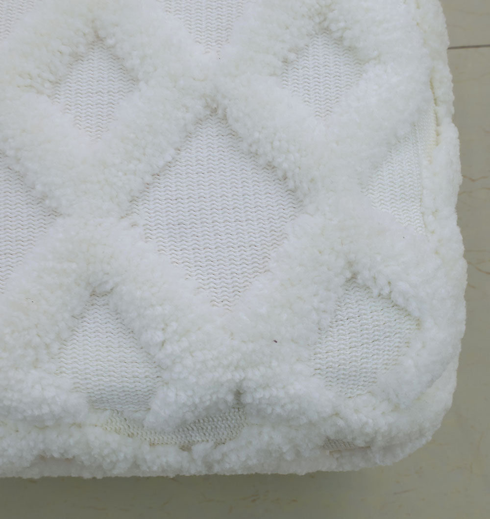 Close-up of the RAMSHA HOME Handmade Pouf with Insert (White, PF-153), featuring soft, textured fabric in a diamond quilted pattern—ideal for adding a plush, premium touch to any space.