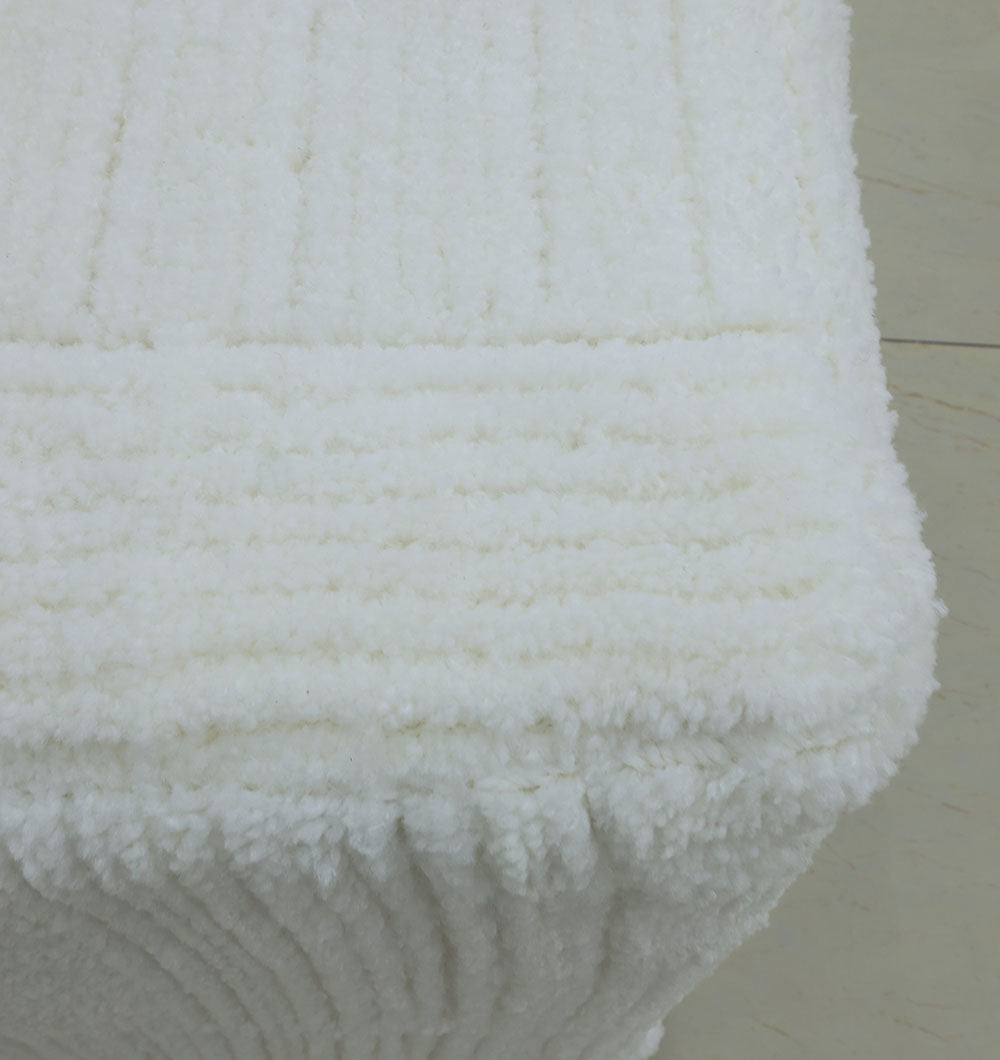 Close-up of RAMSHA HOME’s Handmade Pouf with Insert in White (PF-154), featuring a fluffy, textured surface with soft, raised lines—ideal for elevating any light-toned floor décor.
