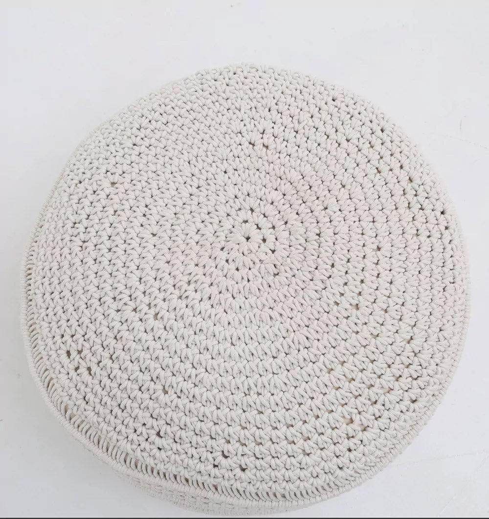 The RAMSHA HOME Boho Macrame Pouf White Round PF-156 features a textured spiral pattern and cozy off-white crochet, bringing charming boho style to any plain white surface.