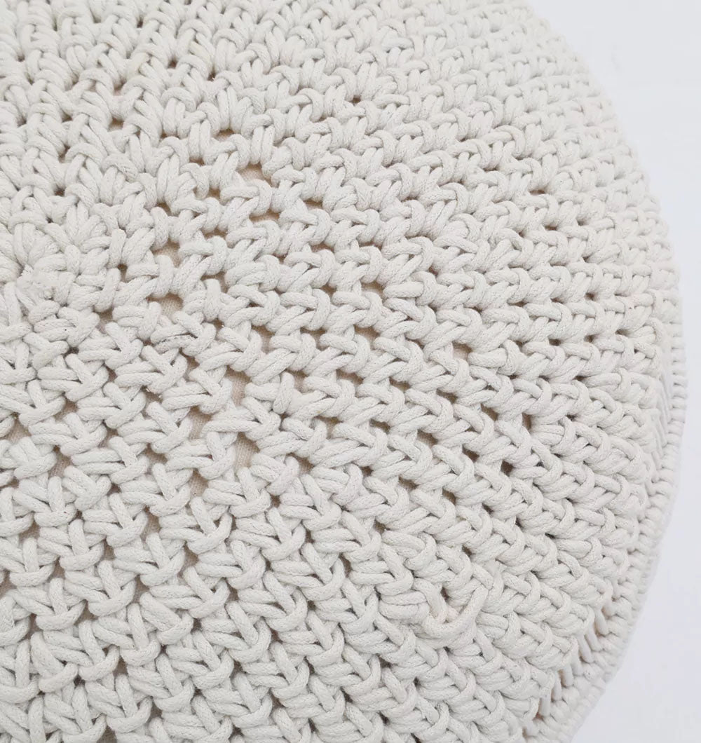 Close-up of the RAMSHA HOME Boho Macrame Pouf White Round PF-159, featuring a cream-colored, textured woven pattern, photographed against a plain white background.