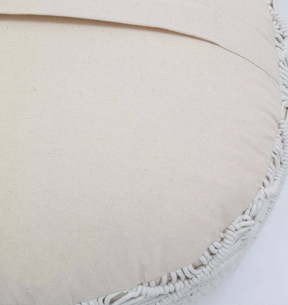 Close-up of the RAMSHA HOME Handwoven White Macrame Pouf with Bean Bag Insert PF 160, showcasing its textured fabric, woven rope border on the right, and subtle thermocol bean filling against a plain background.