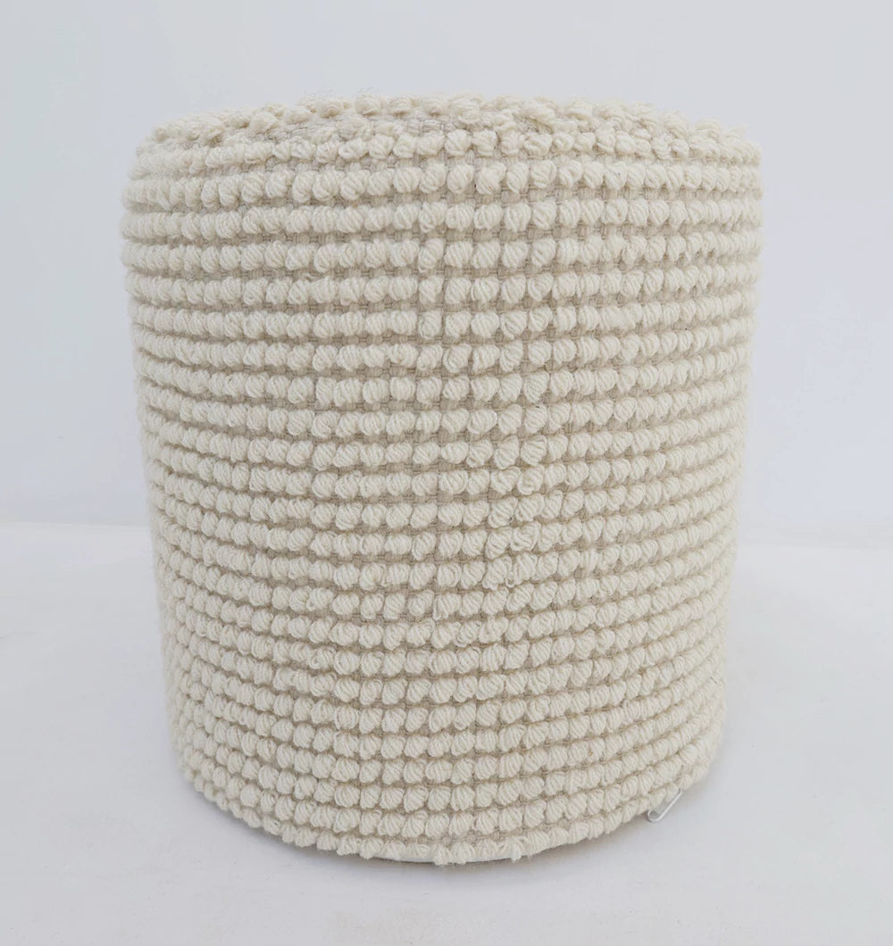 The RAMSHA HOME Handwoven White Macrame Pouf with Bean Bag Insert PF 161 is a cylindrical, off-white, handmade floor cushion with a textured looped yarn surface, adding cozy style and charm against a plain white background.