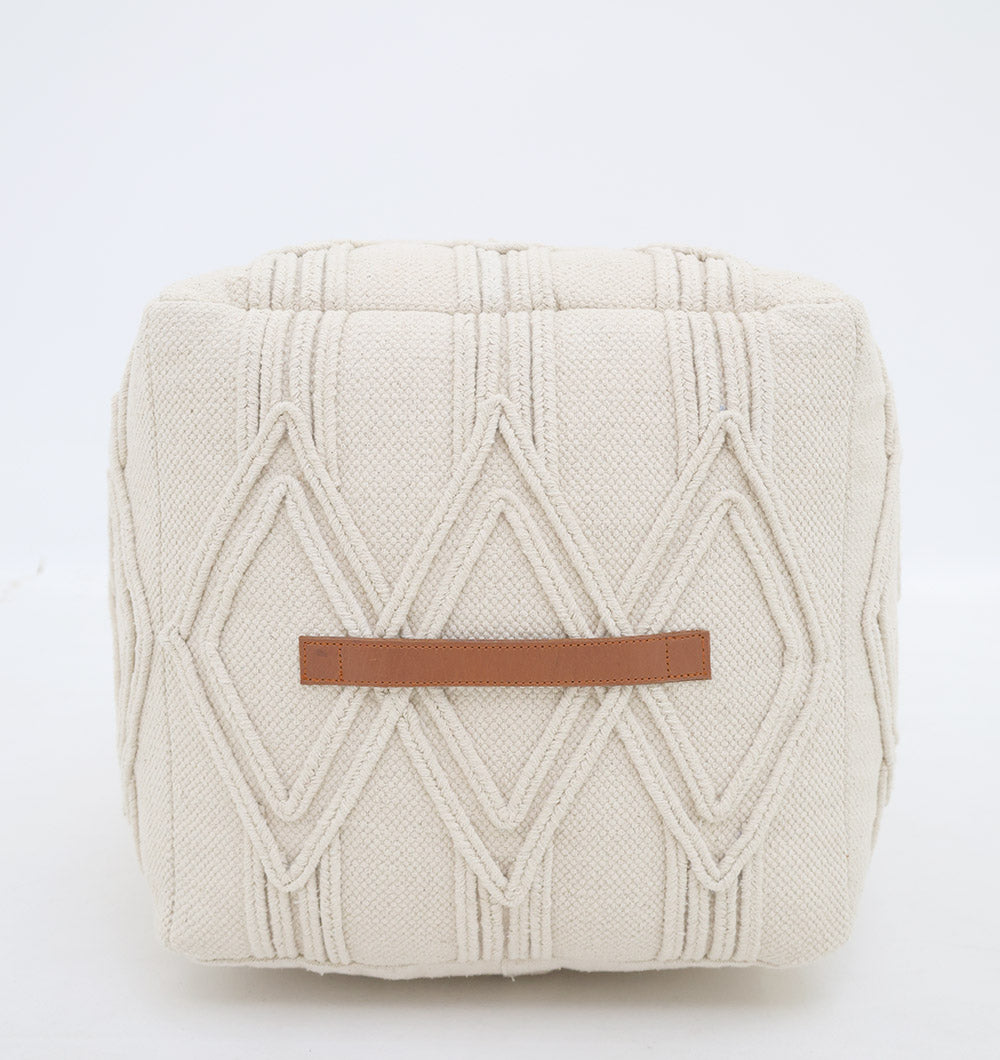 The RAMSHA HOME Ivory Nordic Bliss Cotton Pouf with insert PF 168 is a square, cream-colored pouf featuring textured diamond patterns and a brown faux-leather handle, perfect as a premium accent piece against a plain white background.