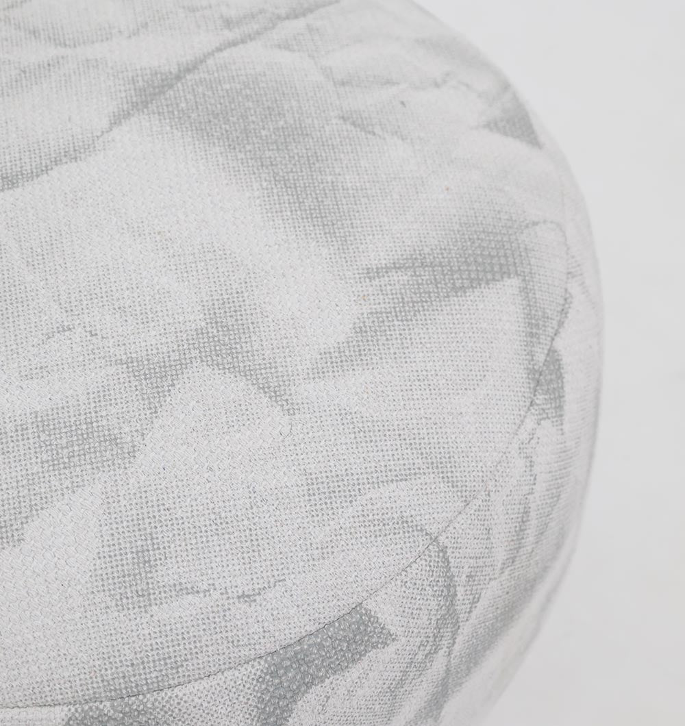 The RAMSHA HOME Round Bohemian Printed Pouf with Comfortable Insert PF 182 features a floral print and textured light grey fabric, adding style to your home décor. Shown here on a white background.