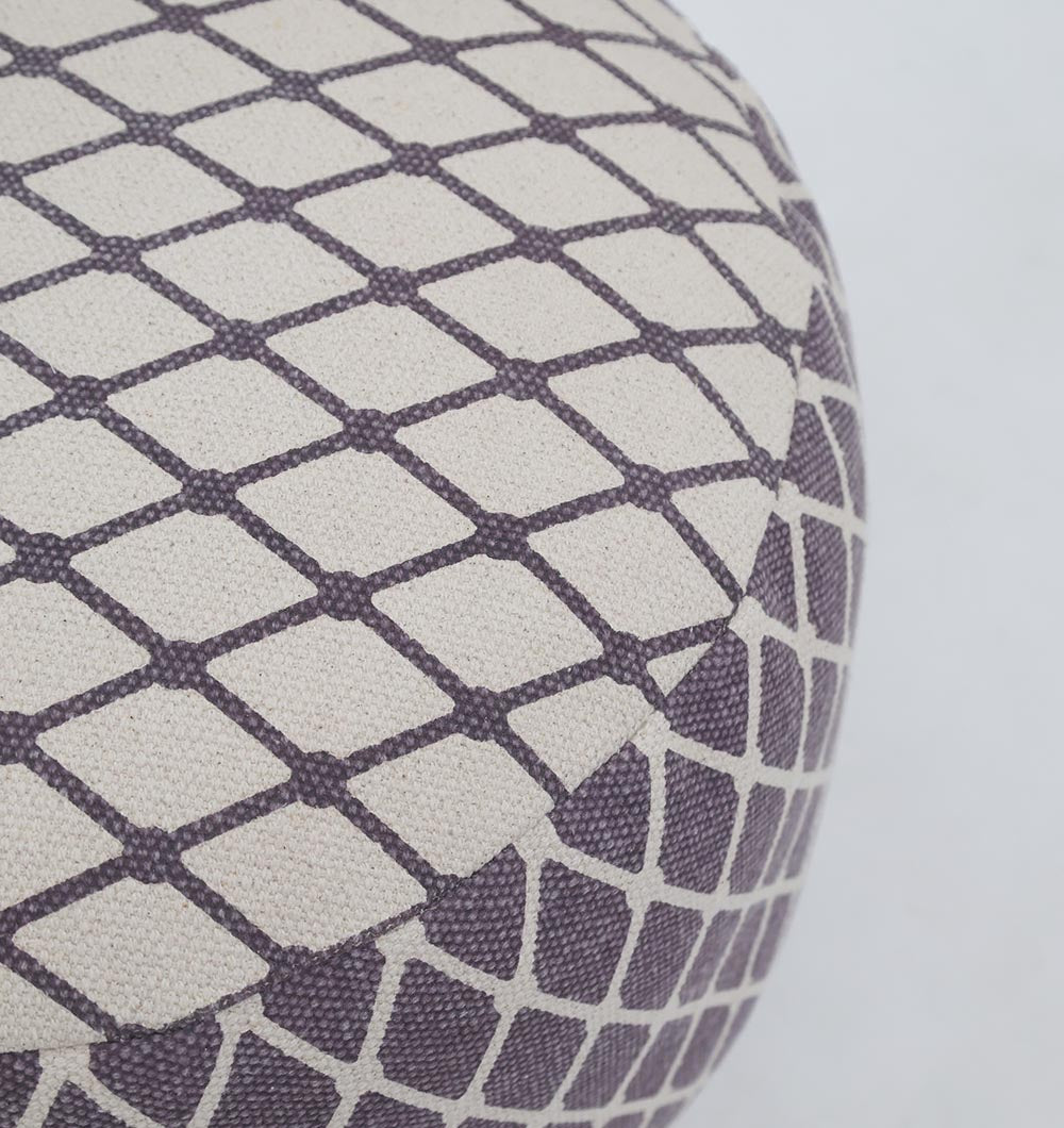 Close-up of the RAMSHA HOME Modern Diamond Pattern Round Pouf with Comfortable Insert PF 184, featuring a dark gray and off-white geometric design—perfect as a stylish accent for modern home décor. Plain, light background highlights its textured cover.