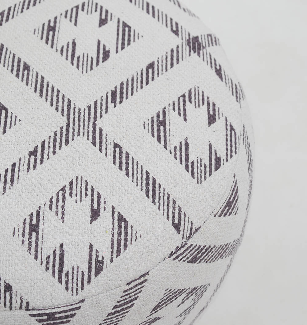 Close-up of the RAMSHA HOME White Color Modern Diamond Pattern Round Pouf with Insert PF 185—this stylish round cushion features a textured geometric diamond design in dark gray on white, making it an elegant home décor accent. Cropped on the right side.