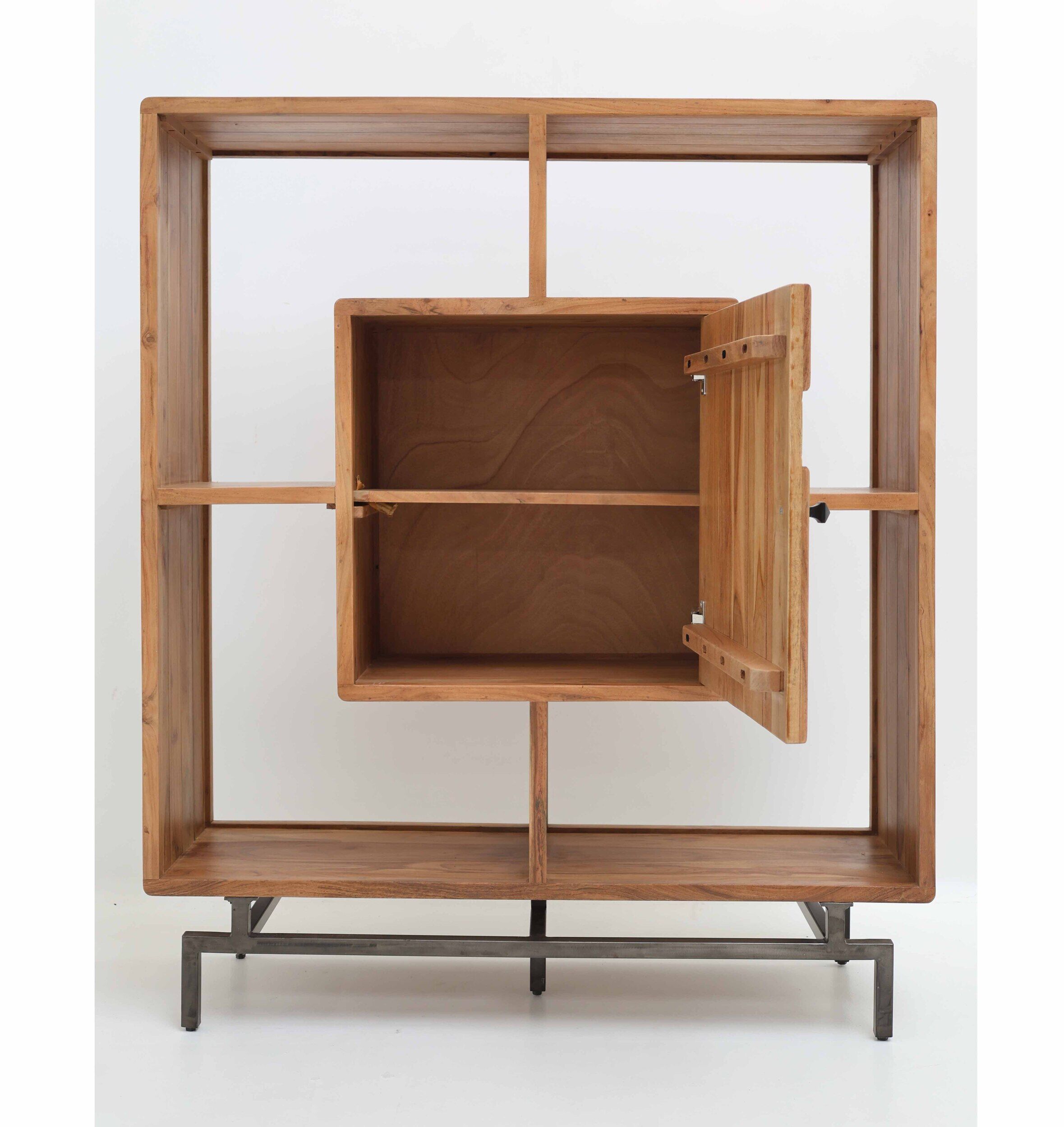 The RAMSHA HOME Wooden Book Shelf With Central Cabinet features a square acacia wood frame, six open shelves, a central cubby with a hinged door, and stands on a black metal base against a white background.