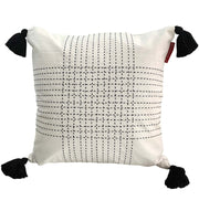 The RAMSHA HOME Embroidery White And Black Cotton Cushion With Tassel CS-192 features a black stitched grid, black tassels on each corner, and adds a stylish touch to your space.